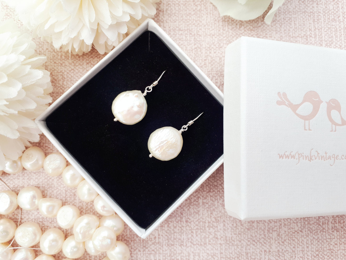 Coin pearl earrings in sterling silver or gold.