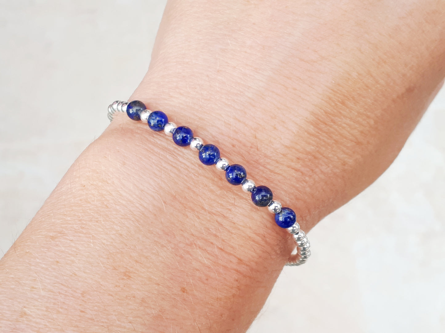 Lapis lazuli milestone bracelet in sterling silver. September birthstone.
