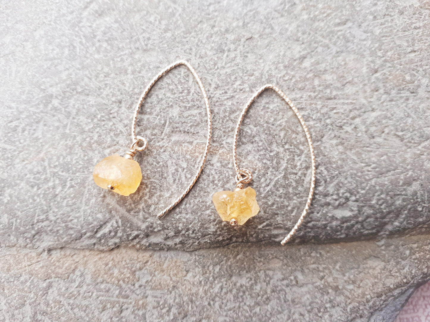Raw citrine earrings in gold.