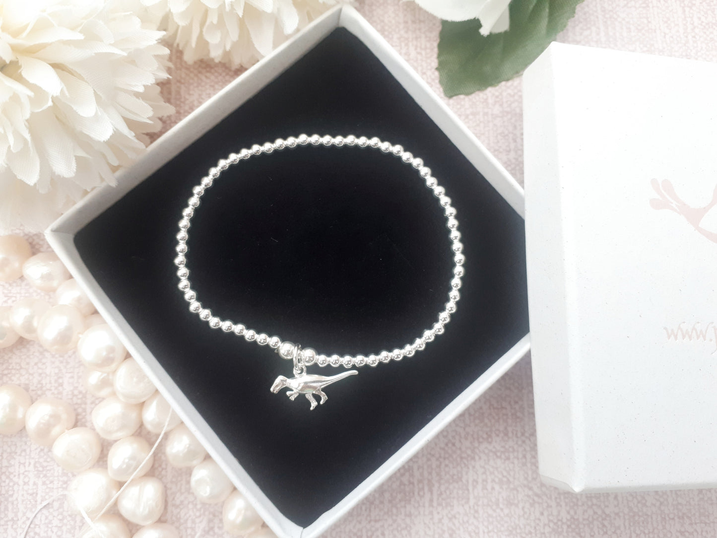 T rex charm bracelet.