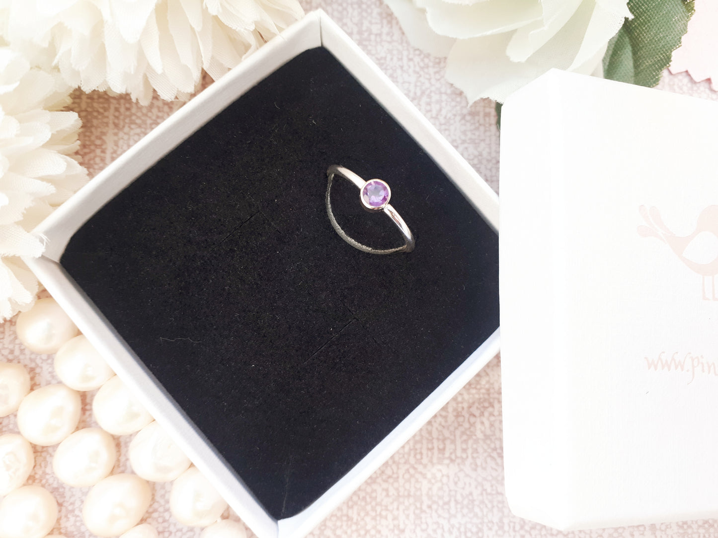 Amethyst gemstone ring. February birthstone ring.