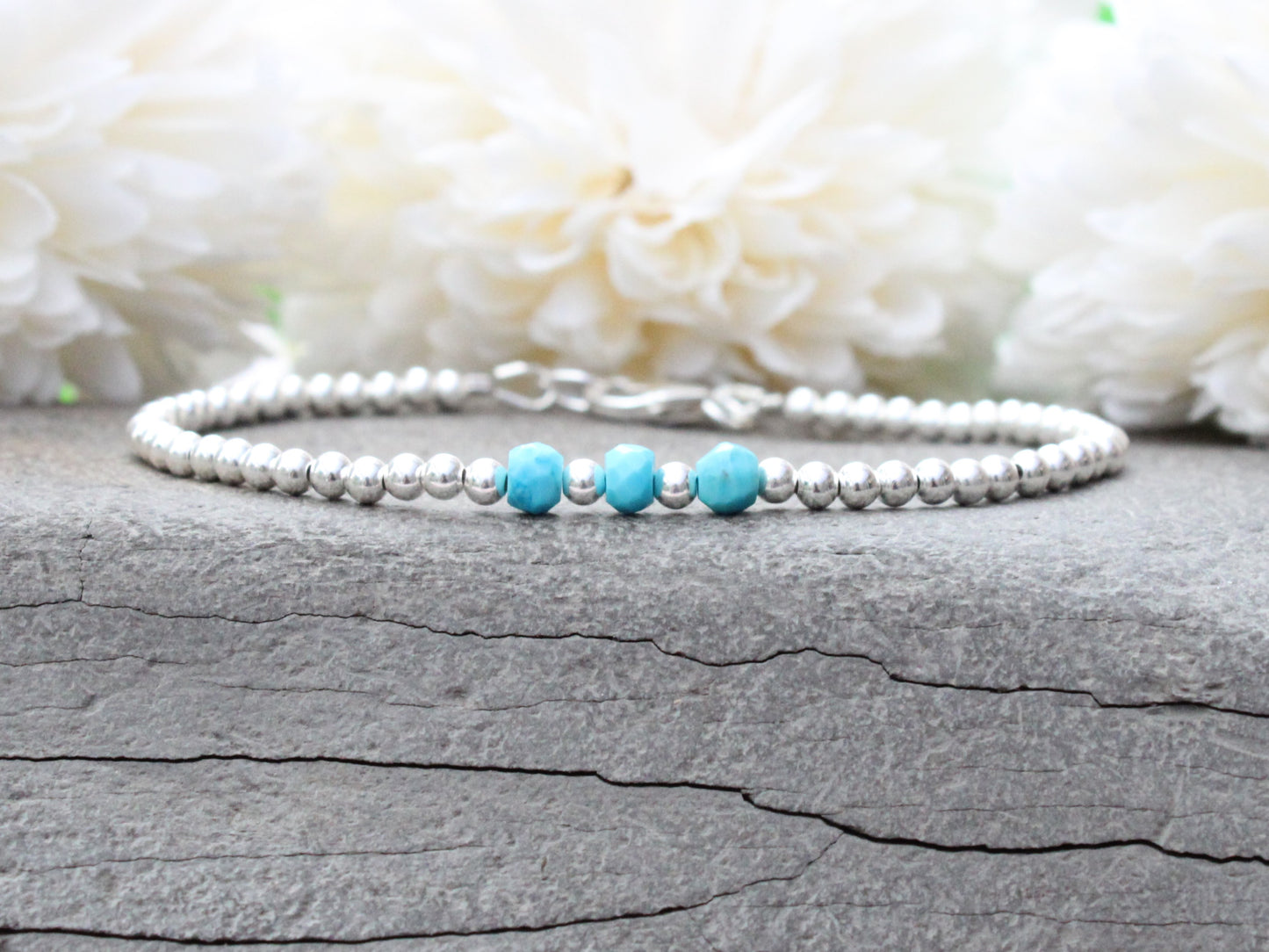 Turquoise milestone bracelet in sterling silver.