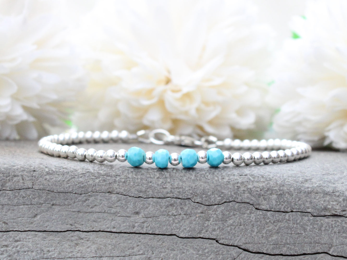 Turquoise milestone bracelet in sterling silver.