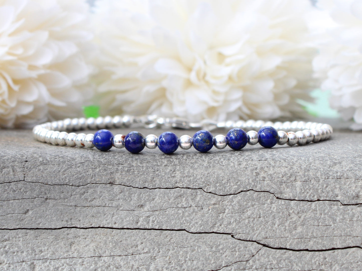 Lapis lazuli milestone bracelet in sterling silver.