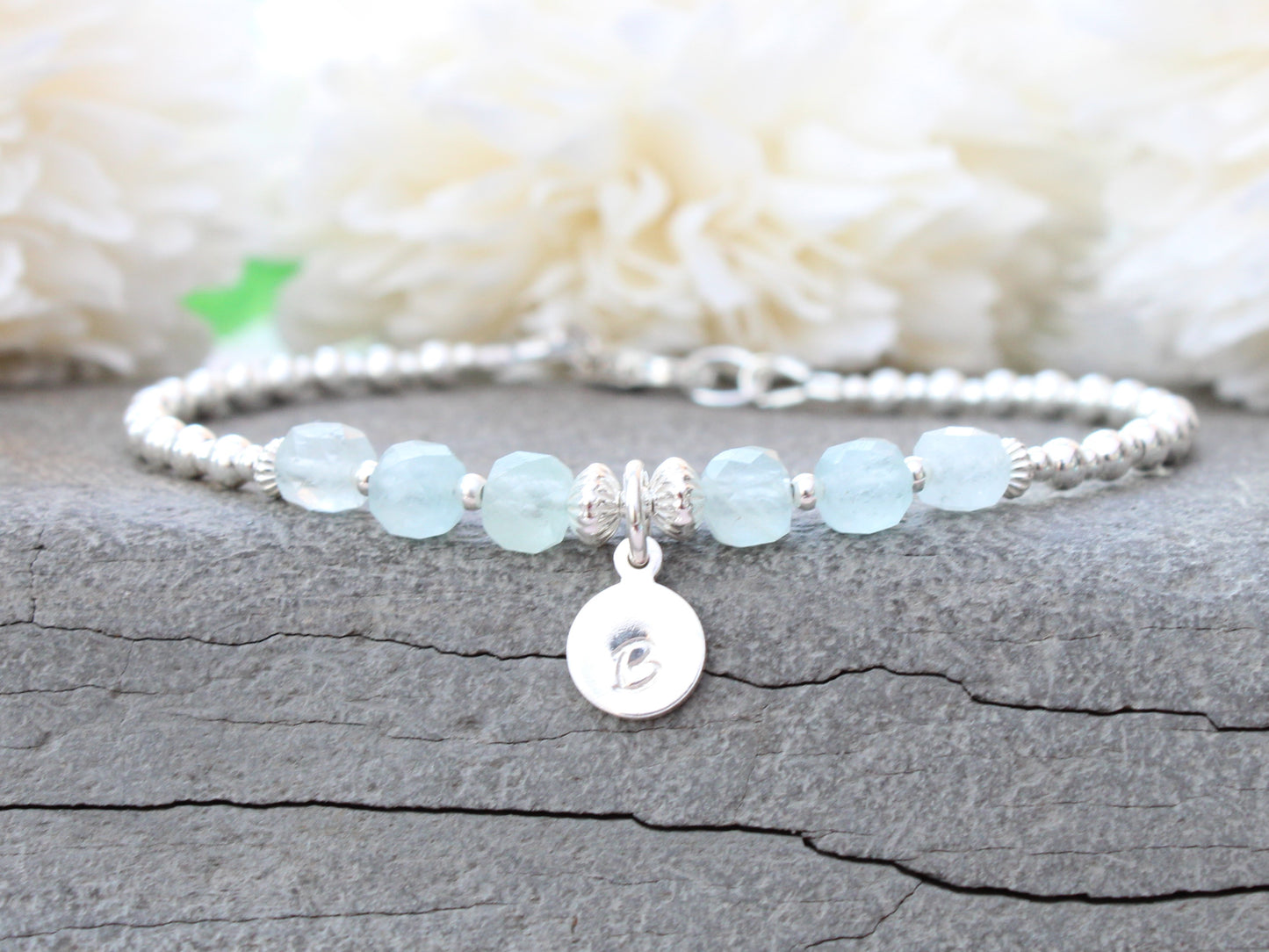 Aquamarine initial gemstone bracelet in silver.