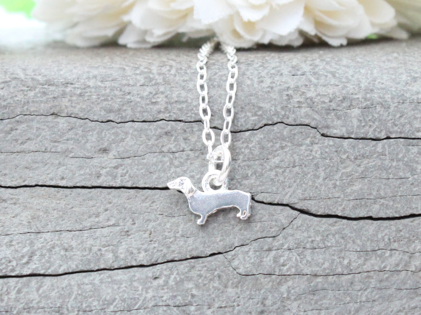 Sterling silver dachshund necklace.
