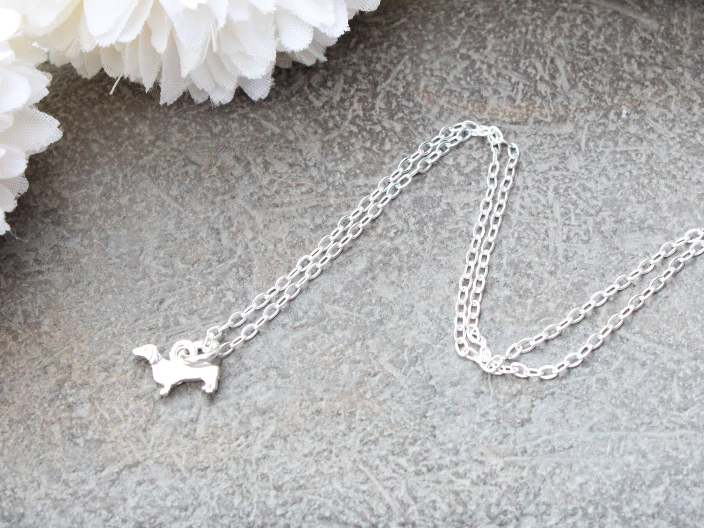 Sterling silver dachshund necklace.