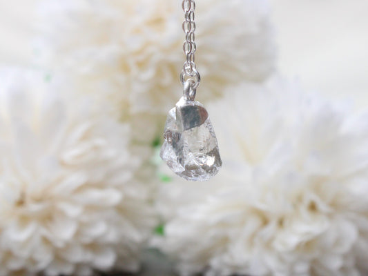 Raw crystal quartz necklace in sterling silver.