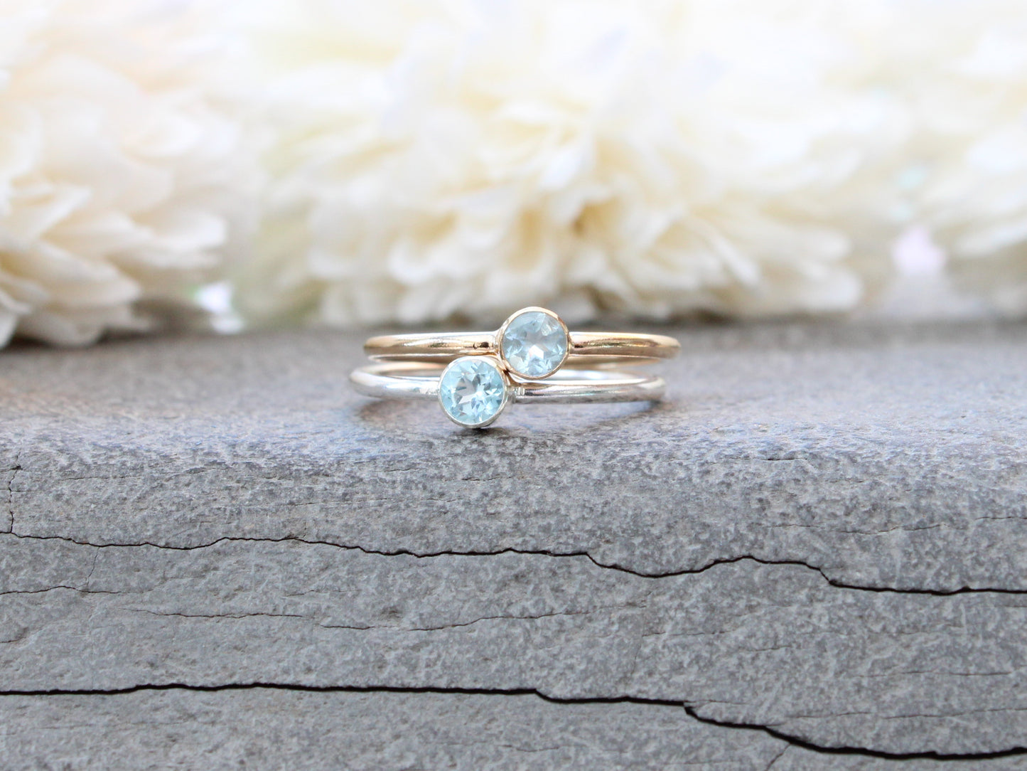 Aquamarine birthstone ring in silver or gold.