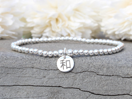 Sterling silver peace and harmony chinese symbol bracelet.