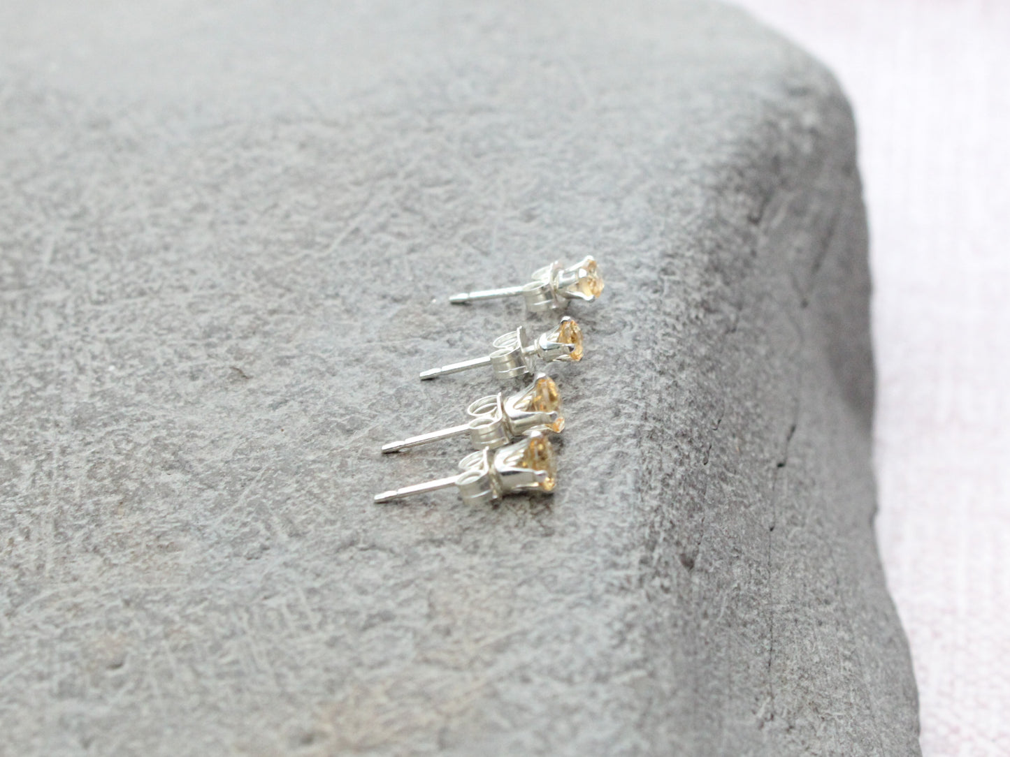 Citrine stud earrings in sterling silver or gold.