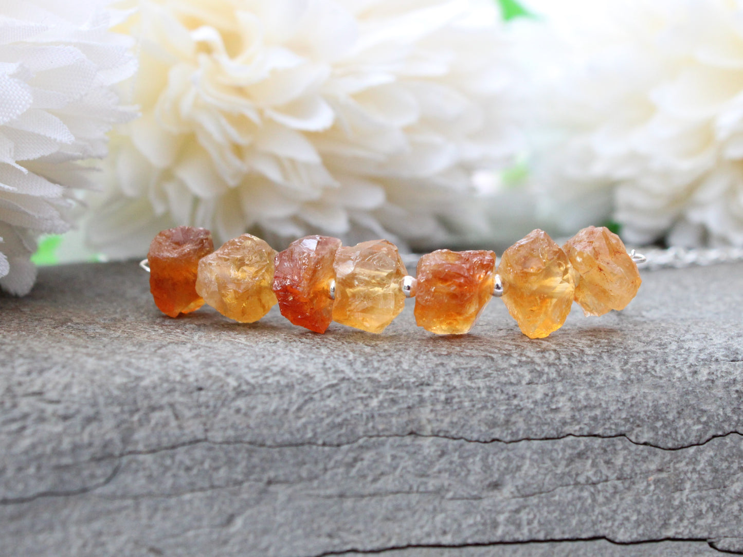 Raw citrine gemstone necklace in silver.