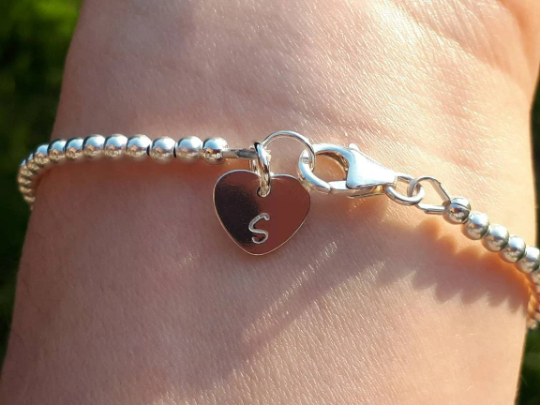 Carnelain bracelet sterling silver with optional personalised initial tag. July birthstone bracelet.