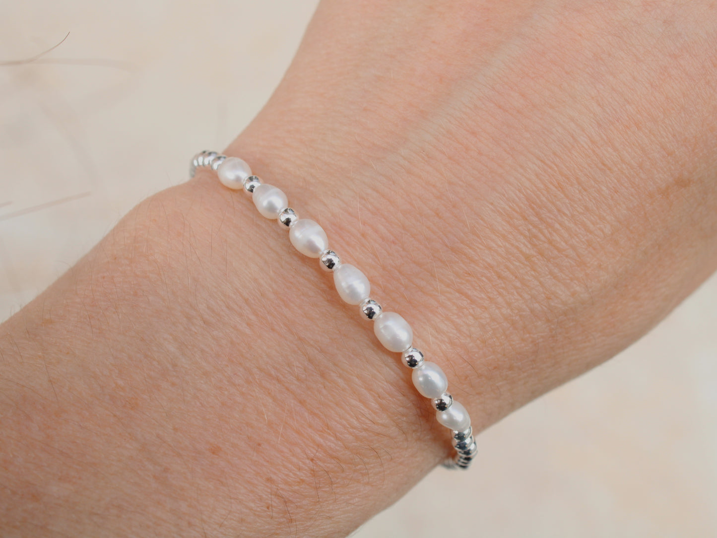 Freshwater pearl milestone bracelet.