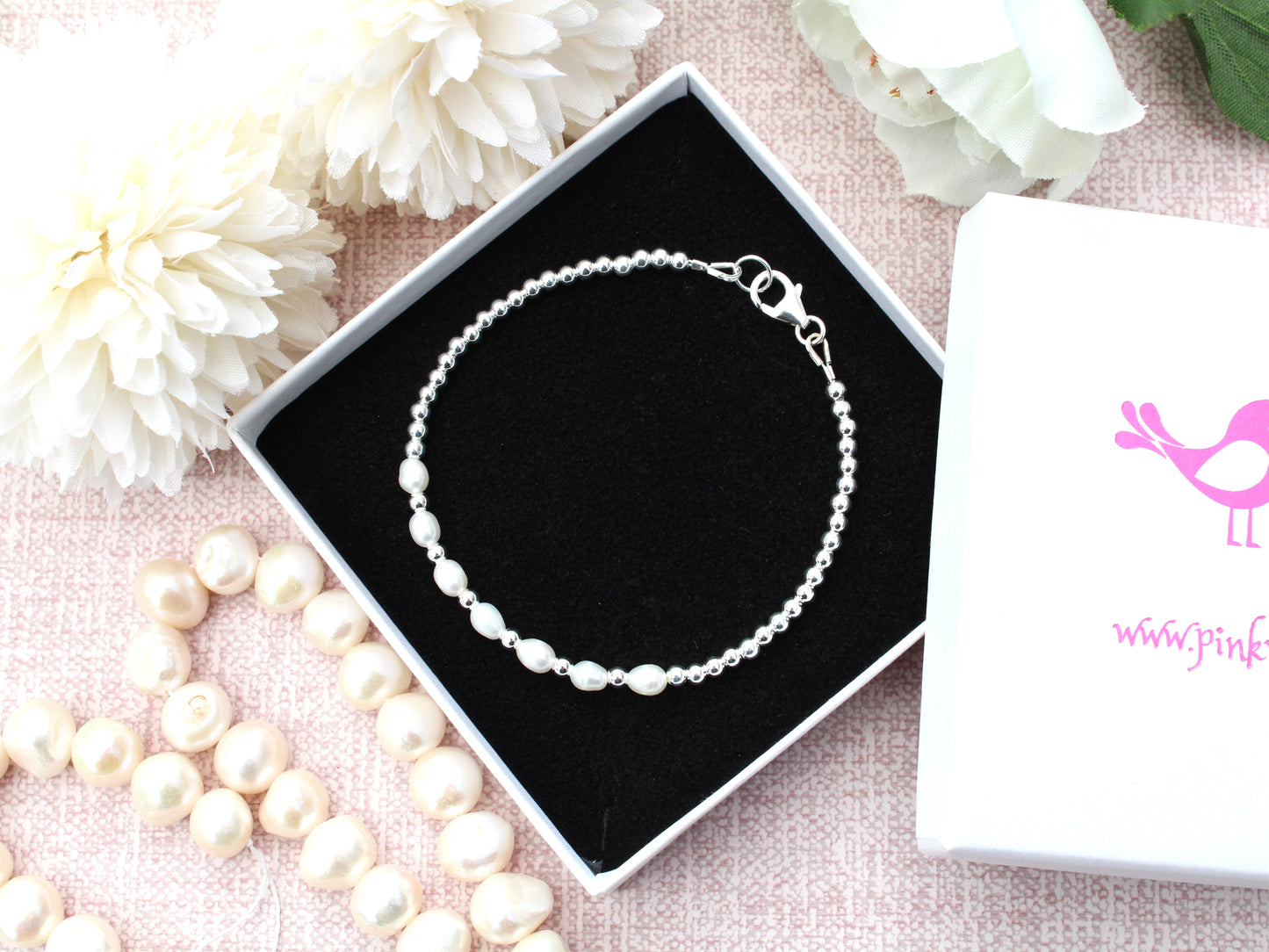 Freshwater pearl milestone bracelet.