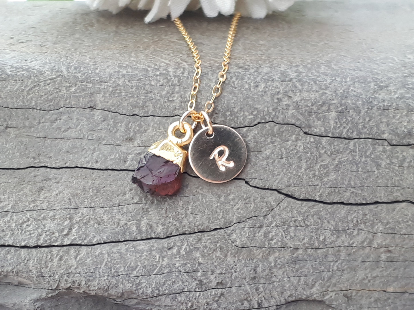 Personalised raw garnet necklace in gold.