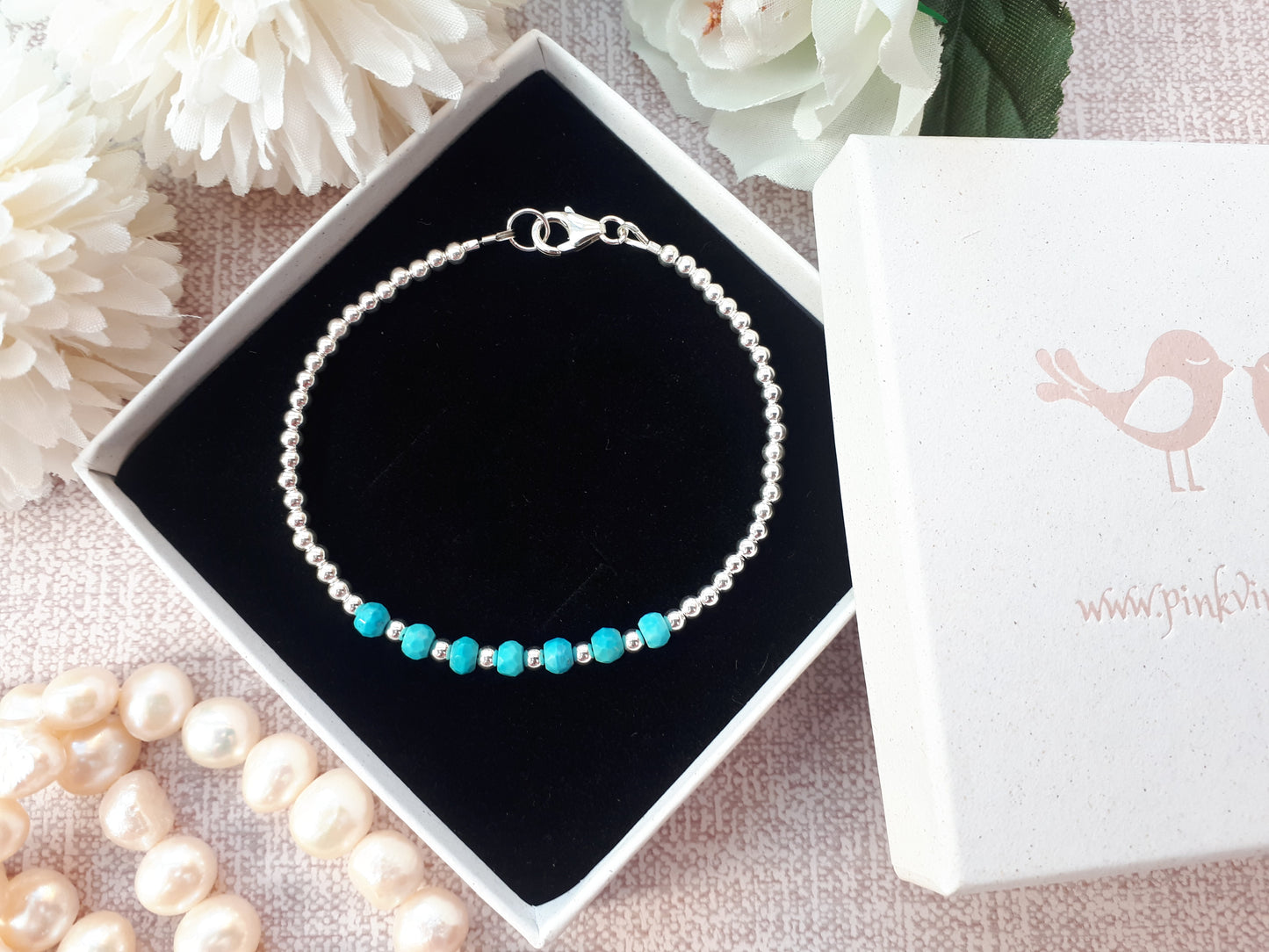 Turquoise milestone bracelet in sterling silver.