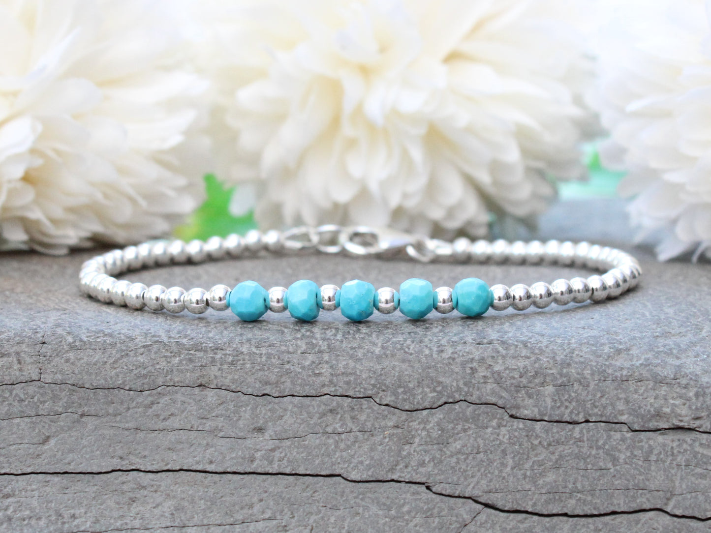 Turquoise milestone bracelet in sterling silver.