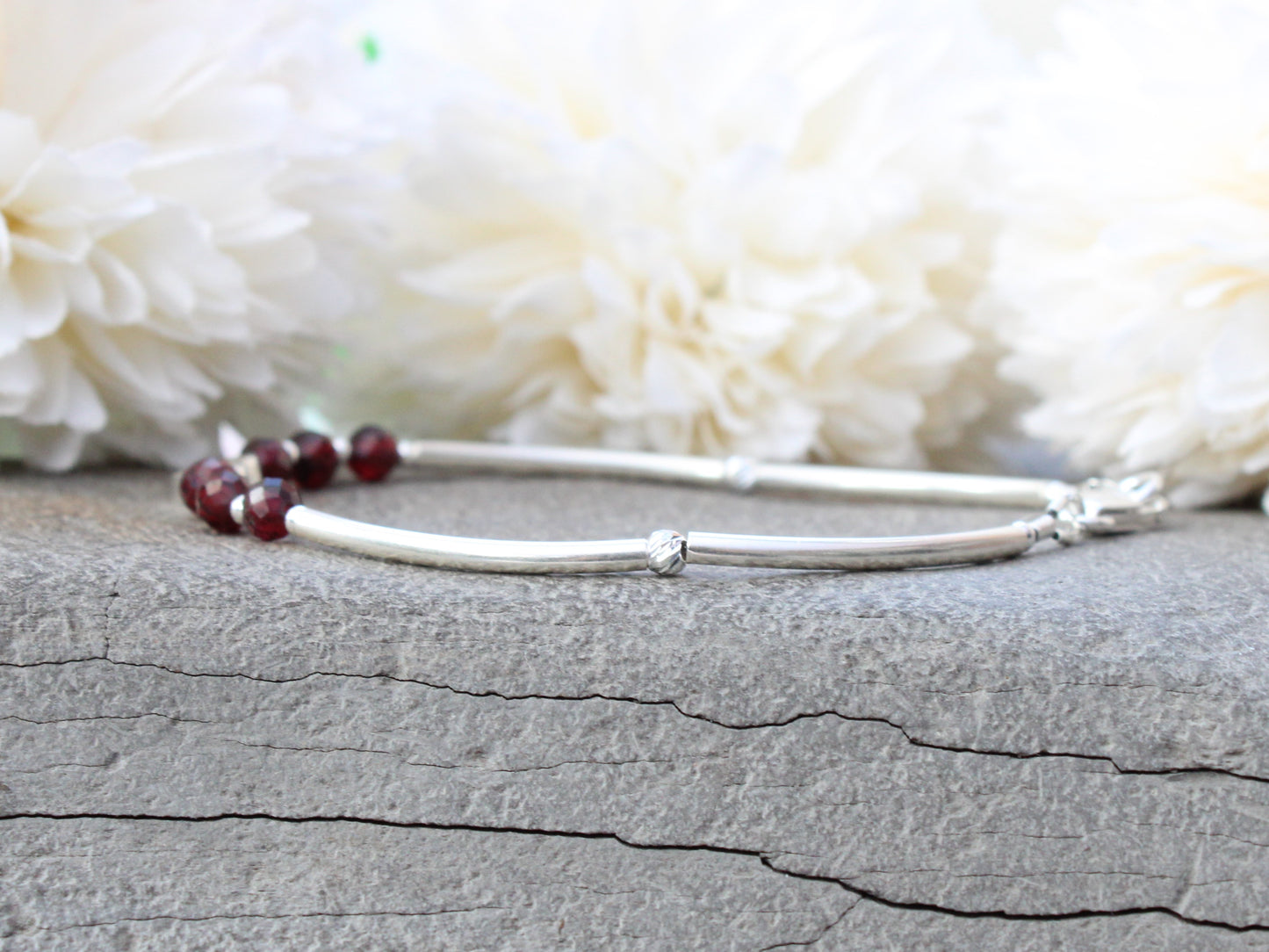 Garnet bead bracelet in sterling silver.