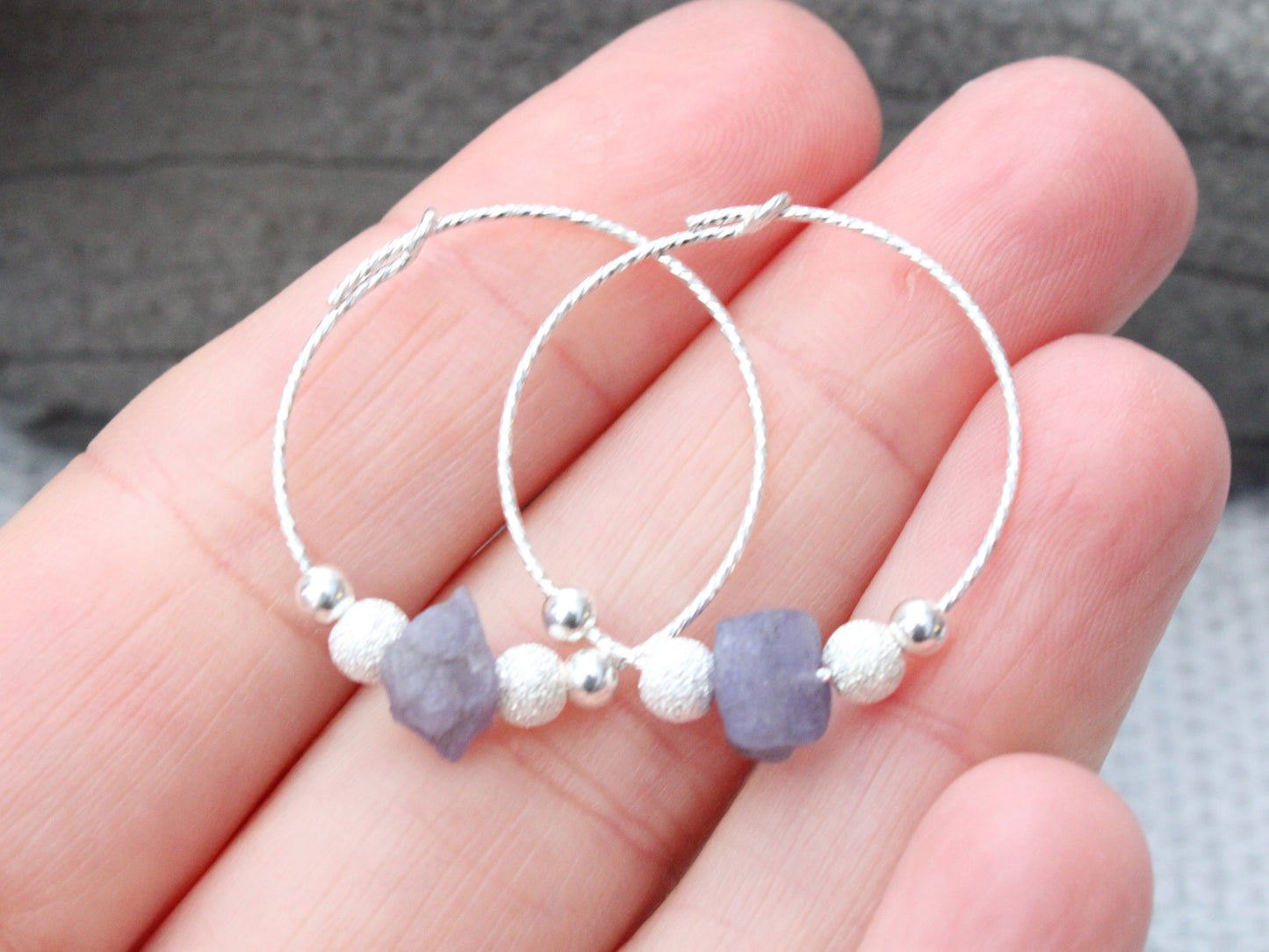 Raw tanzanite hoop earrings. December birthstone earrings.