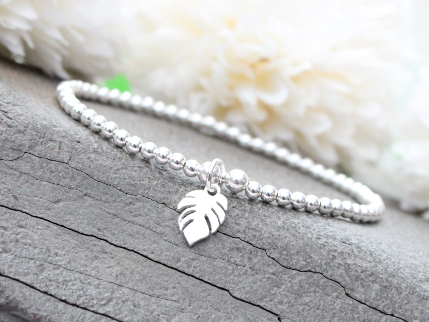 Sterling silver beaded monstera leaf bracelet.