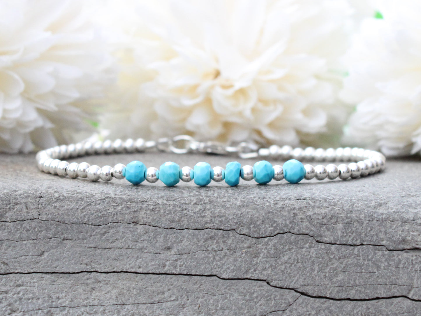 Turquoise milestone bracelet in sterling silver.