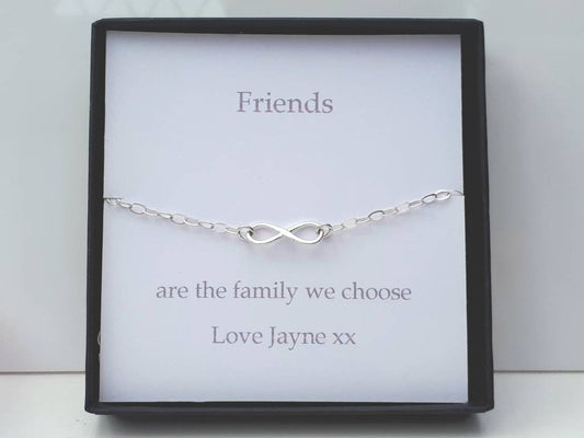 Sterling silver friendship infinity bracelet with personalised initial heart tag.