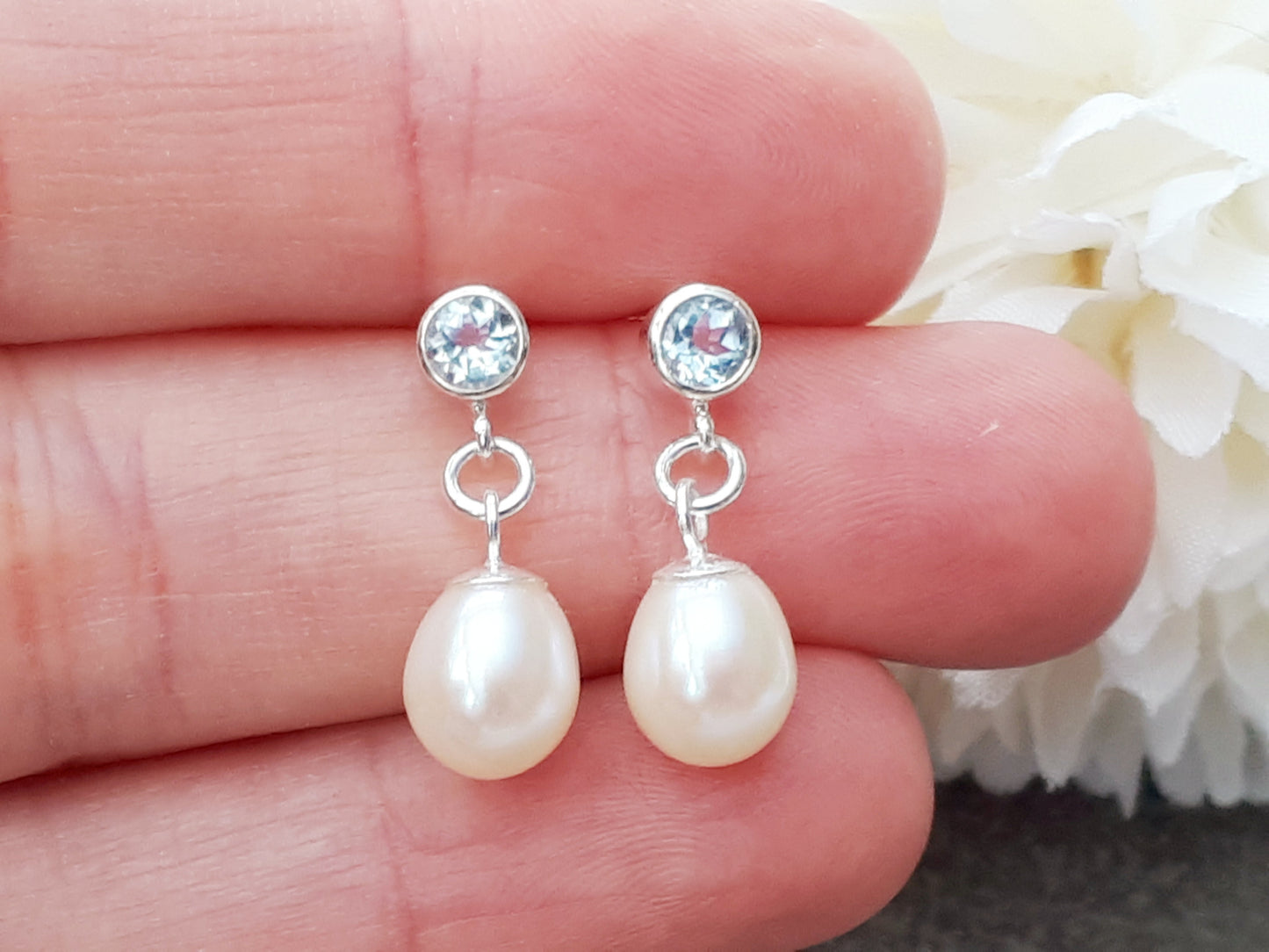 Aquamarine and pearl drop earrings.