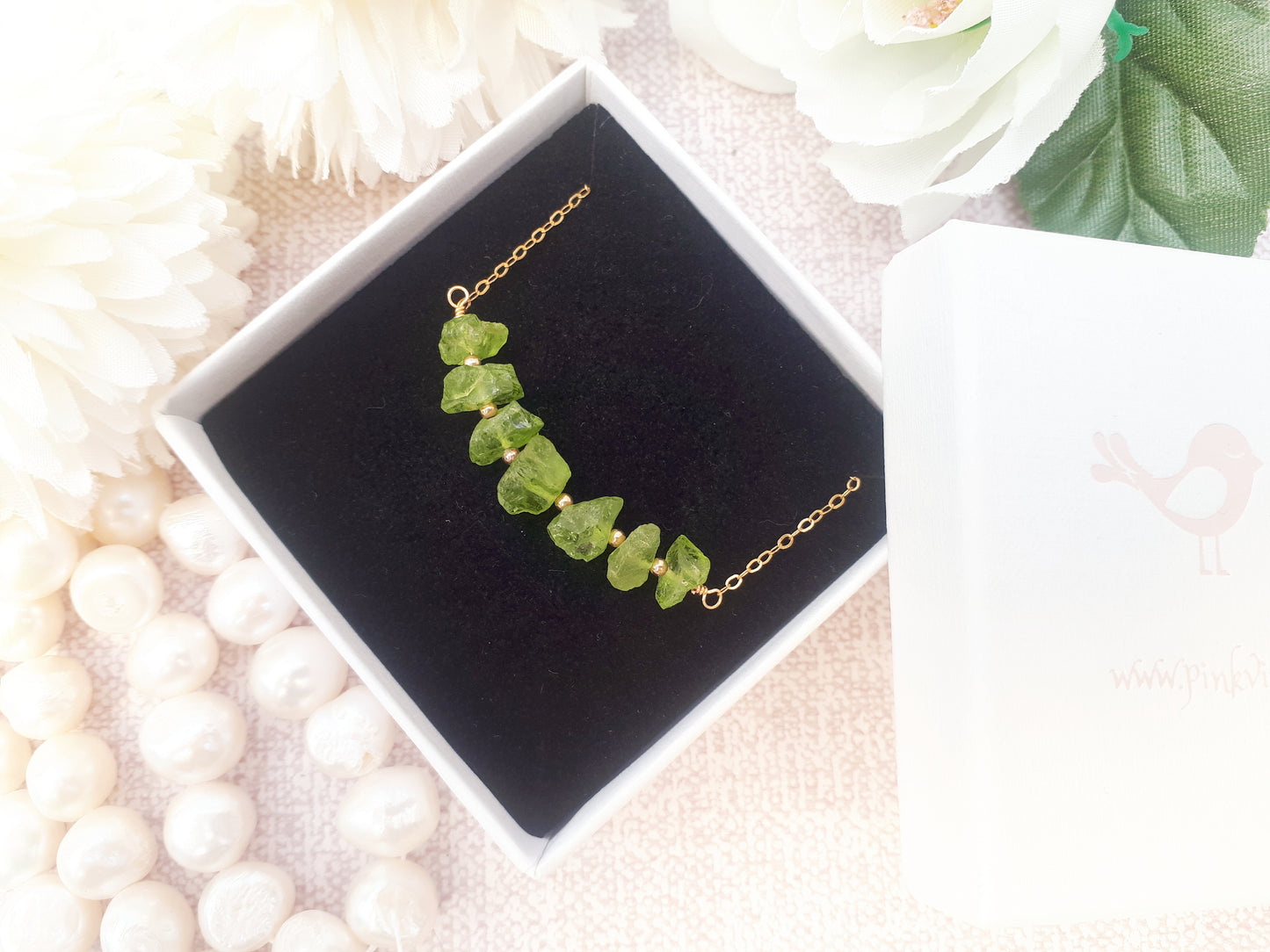 Raw peridot necklace in sterling silver or gold.