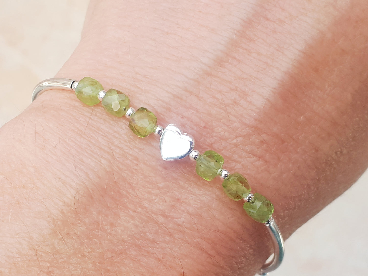 Peridot bracelet in silver. August birthday gift.