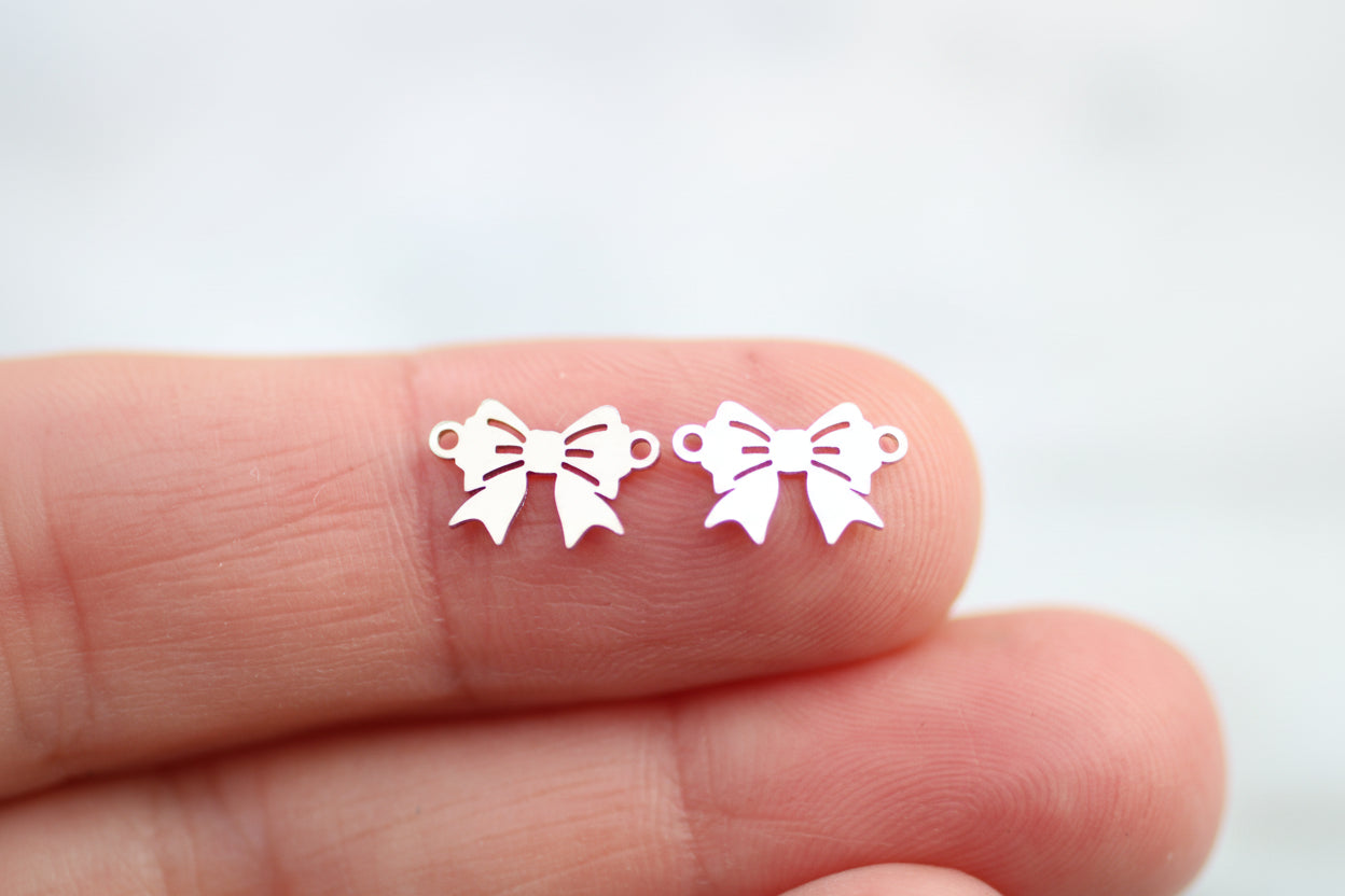 Bow connector in sterling silver or gold filled.