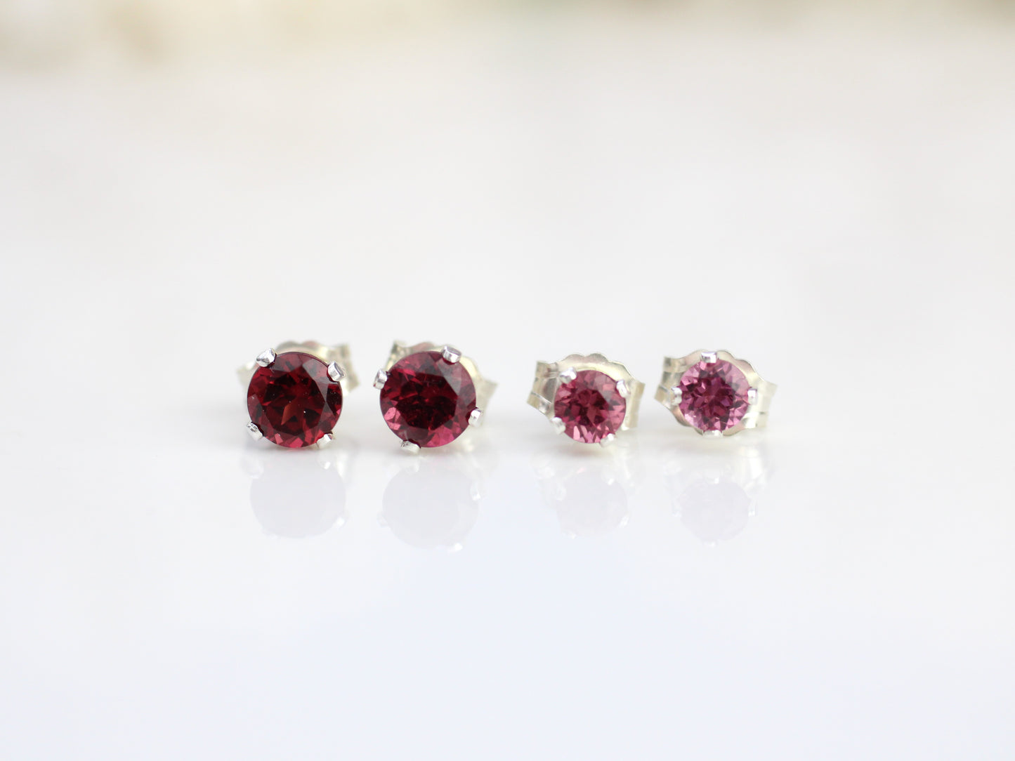 Rhodolite garnet stud earrings in silver or gold.