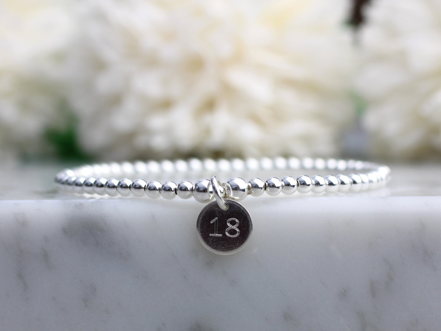 18th birthday bracelet in sterling silver.