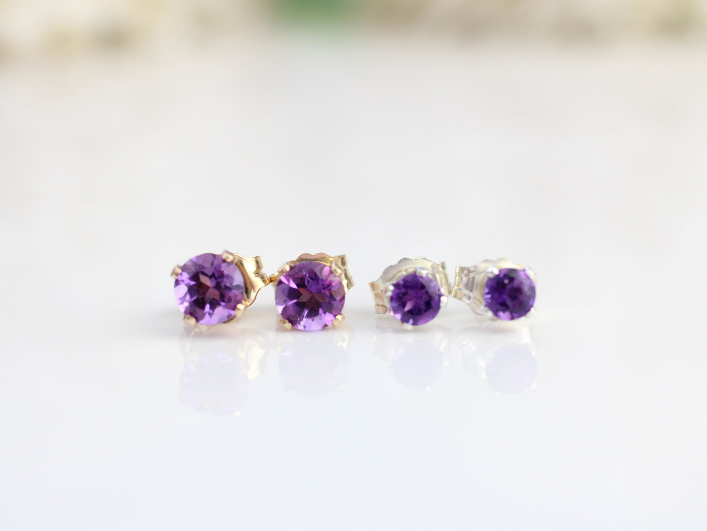 Amethyst stud earrings in silver. Ready to ship.