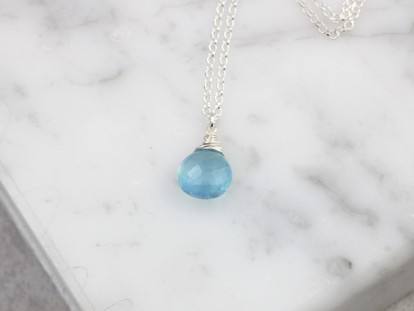 Aquamarine necklace in silver or gold.