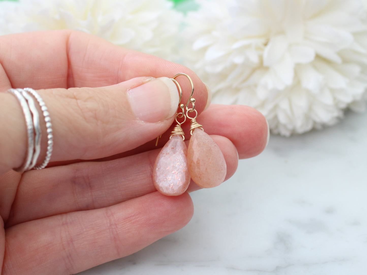 Peach moonstone drop earrings.