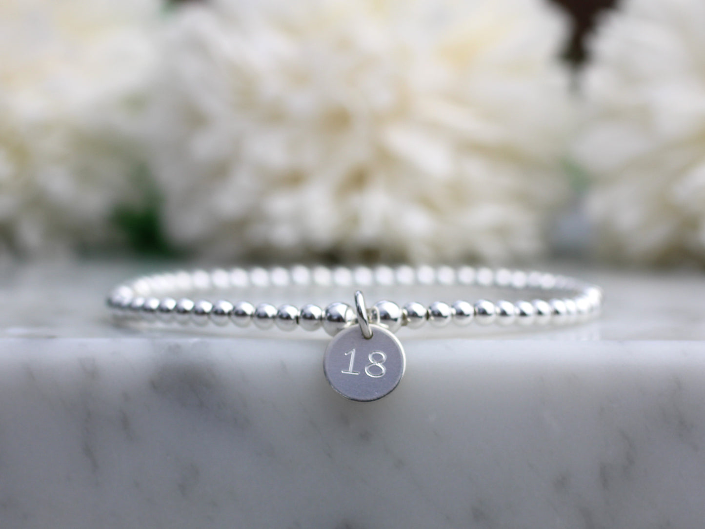 18th birthday bracelet in sterling silver.