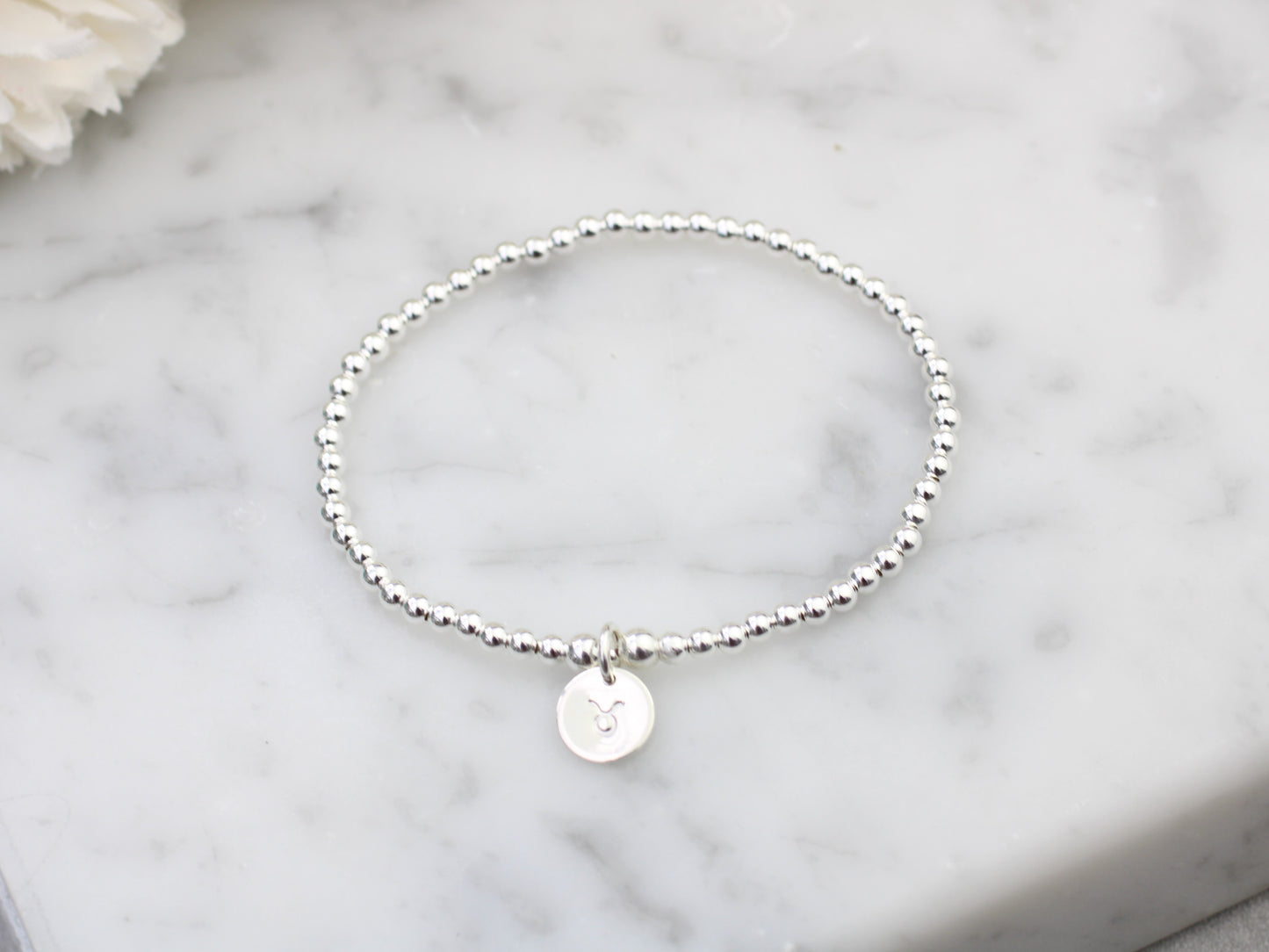 Zodiac stretch bracelet.