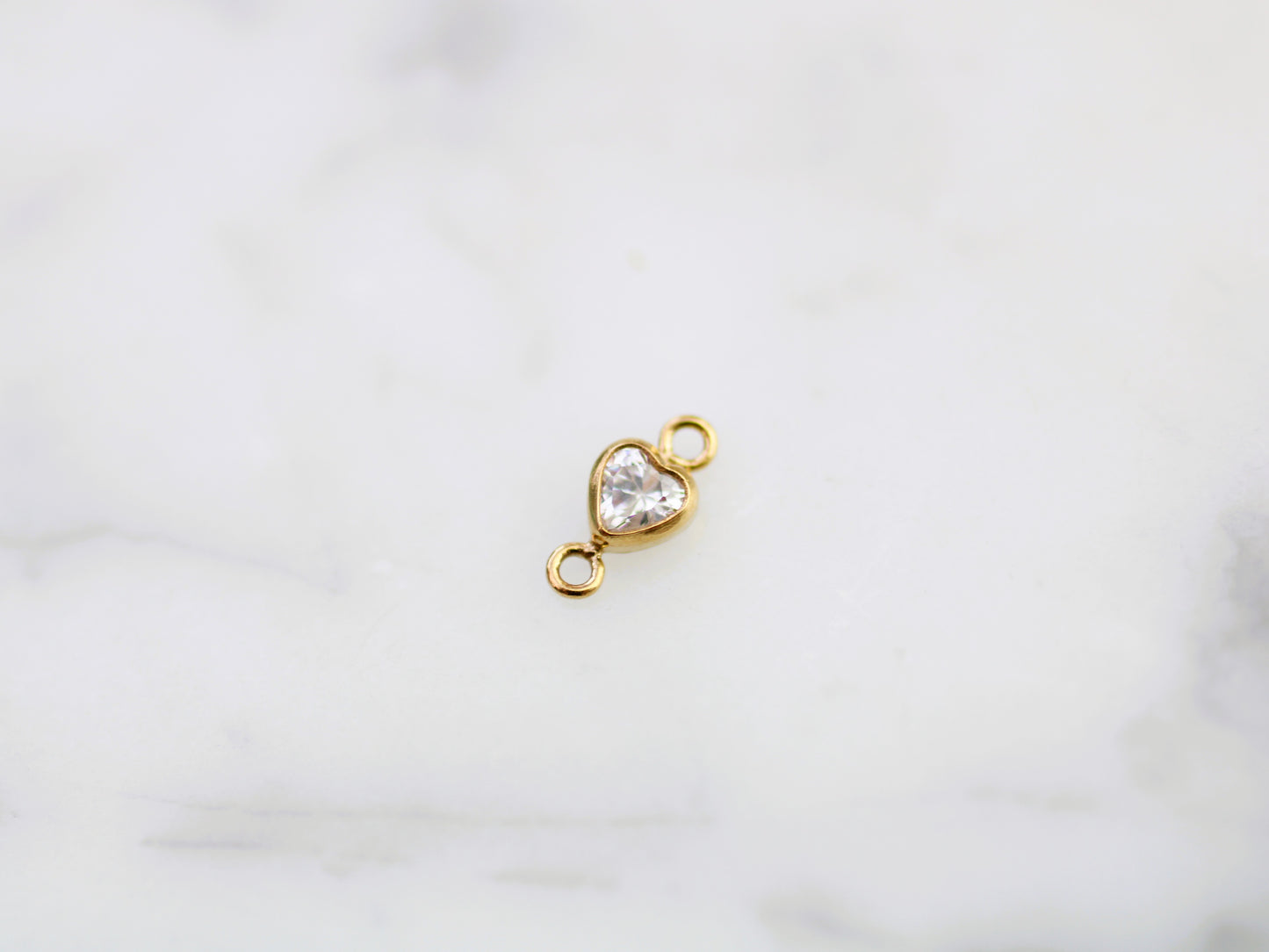 Gold filled 3 mm crystal heart connector.