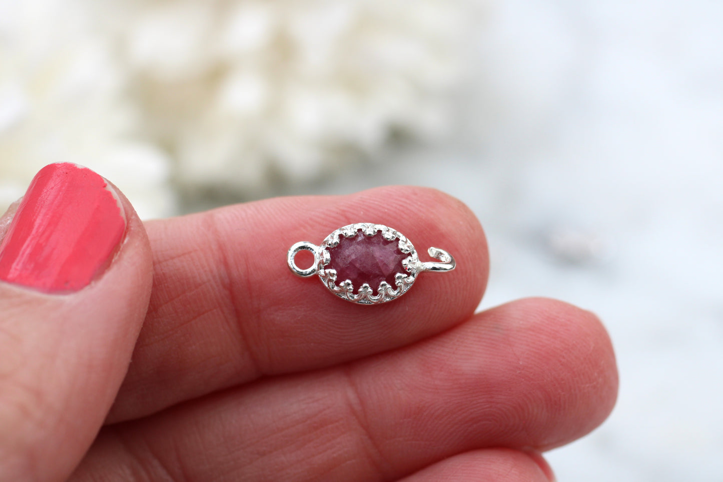Natural ruby connector in sterling silver.