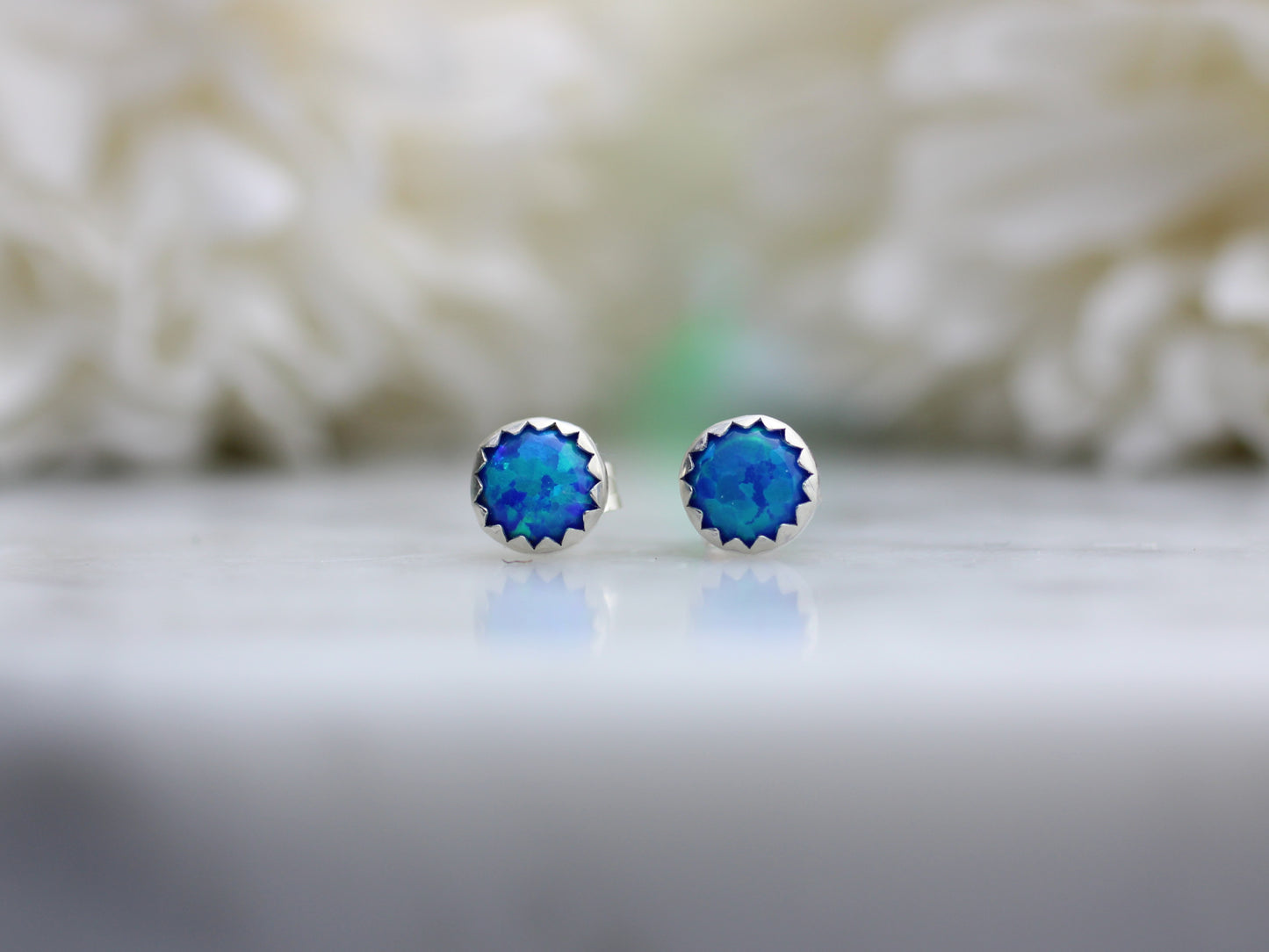 Blue opal stud earrings.