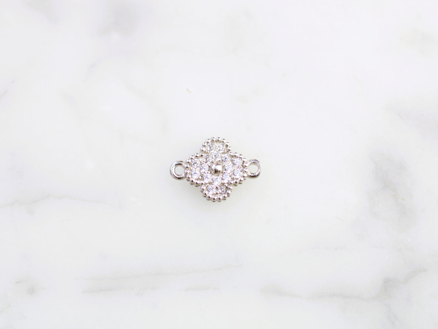 Crystal clover connector.