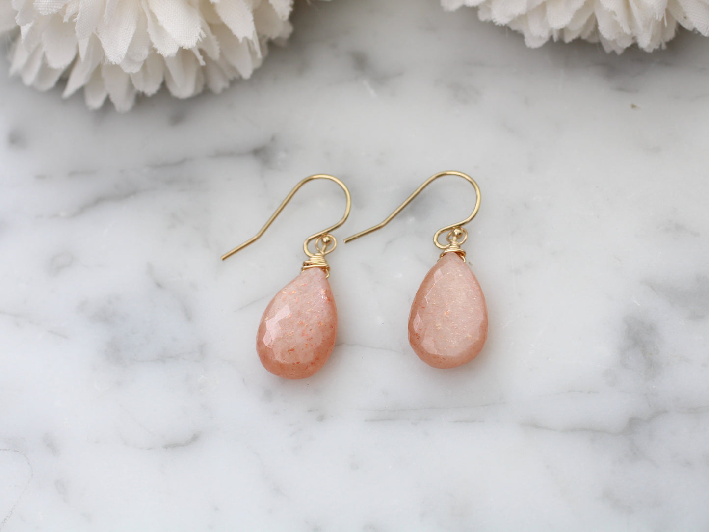 Peach moonstone drop earrings.