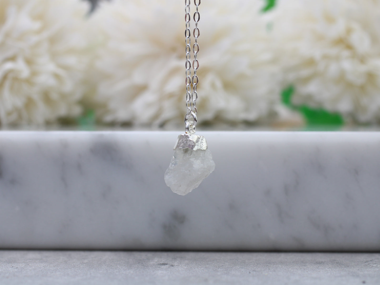 Silver moonstone necklace.