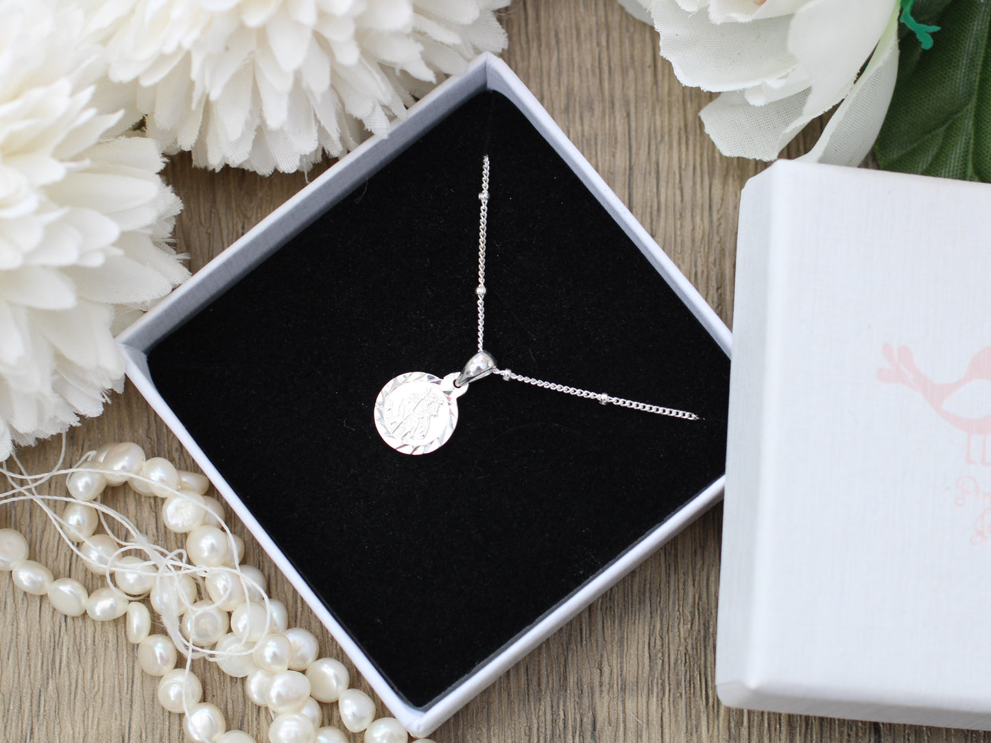 Saint Christopher necklace in silver.