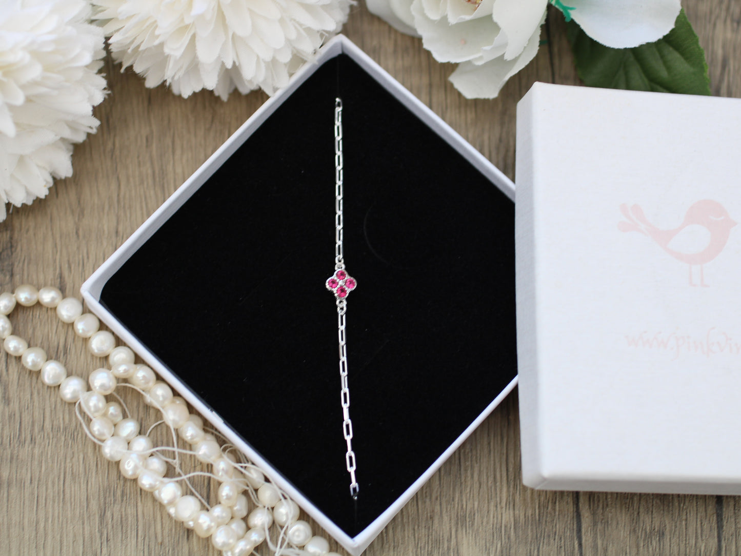 Pink clover bracelet in sterling silver.