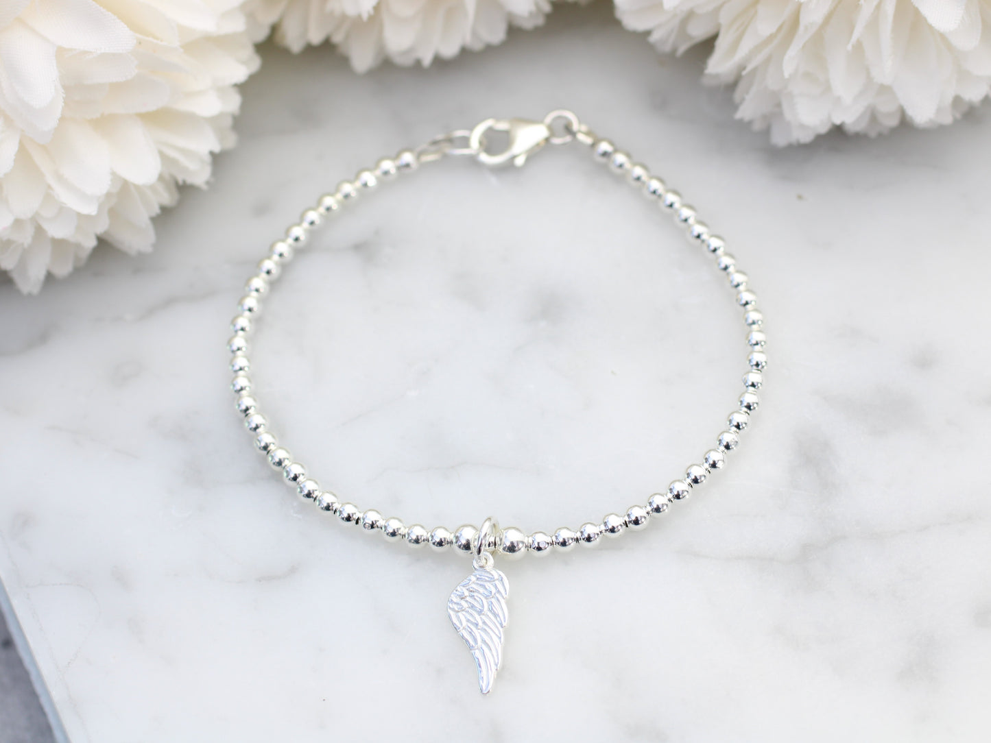 Angel wing charm bracelet.