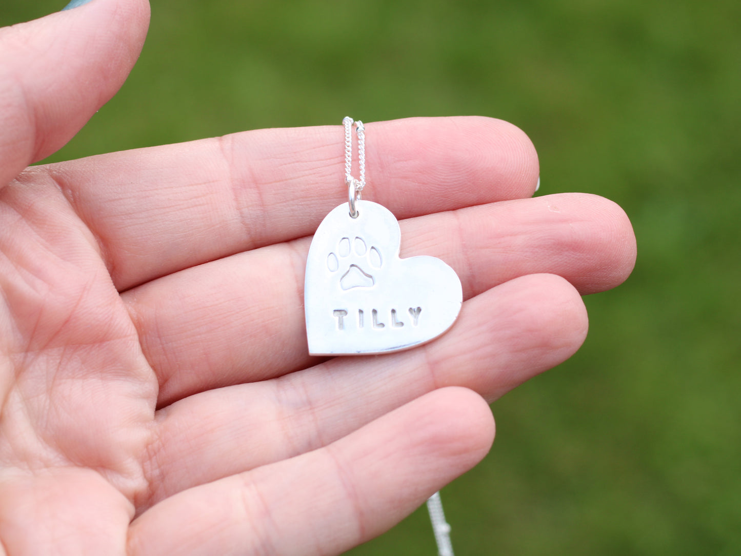 Personalised paw print necklace.