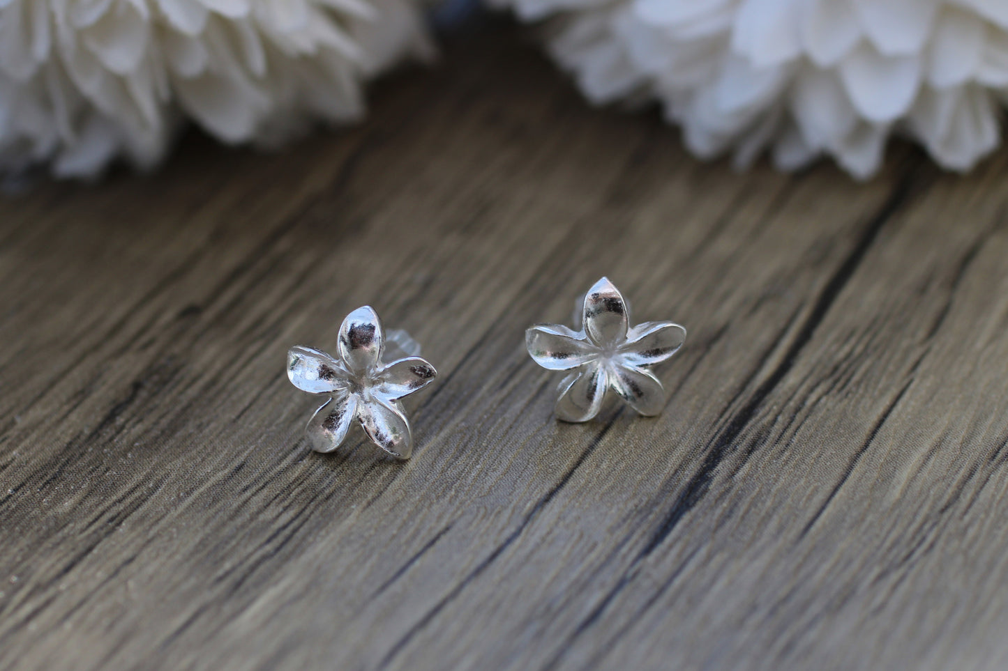 Handmade Sterling Silver Frangipani stud earrings.