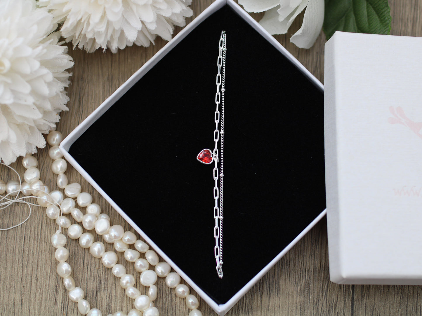 Birth month crystal layered bracelet.